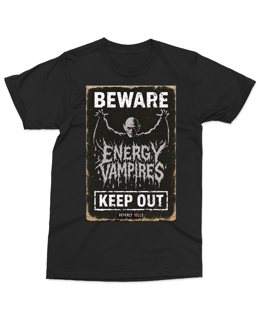 Black t-shirt with a vintage horror style graphic featuring a vampire and the text Beware Energy Vampires Keep Out from Beverly Kills.